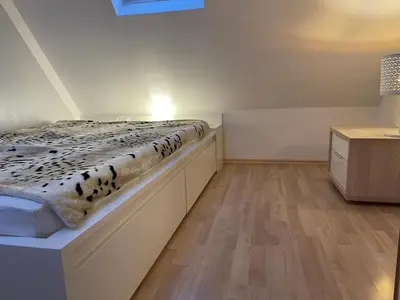 Ein Bett oder Betten in einem Zimmer der Unterkunft Maria vacation apartment with Elbe view