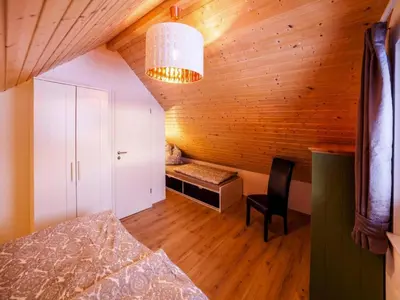Ein Bett oder Betten in einem Zimmer der Unterkunft Ferienhaus am Partwitzer See, Elsterheide