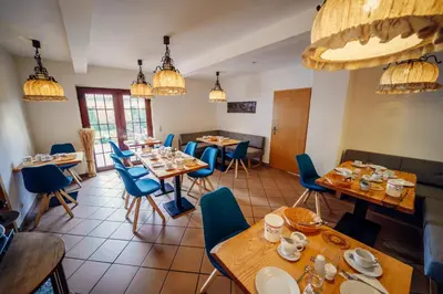 Ein Sitzbereich in der Unterkunft Hotel-Pension Hafemann