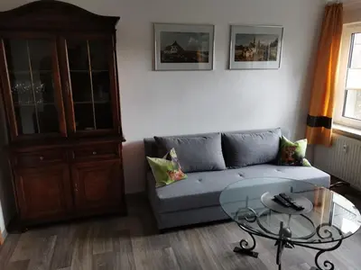 Ein Sitzbereich in der Unterkunft Ferienwohnung Lohrum