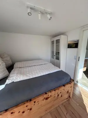 Ein Bett oder Betten in einem Zimmer der Unterkunft Ferienhaus Abendsonne