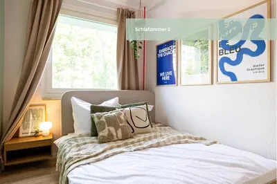 Ein Bett oder Betten in einem Zimmer der Unterkunft StayTime - Trio Loft