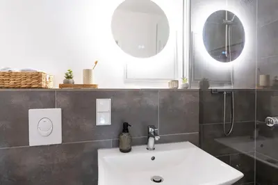 Ein Badezimmer in der Unterkunft StayTime - Trio Loft