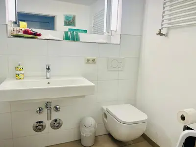 Ein Badezimmer in der Unterkunft Ferienwohnung Luxuriöse Maisonettewohnung am Weißen Hirsch - 
