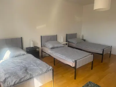 Ein Bett oder Betten in einem Zimmer der Unterkunft großzügige Monteurwohnung für 6