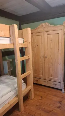 Ein Bett oder Betten in einem Zimmer der Unterkunft Ferienhaus Gut Haselbach im Erzgebirge