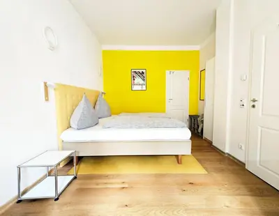 Ein Bett oder Betten in einem Zimmer der Unterkunft Ferienwohnung Villa 16F