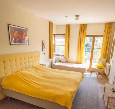 Ein Bett oder Betten in einem Zimmer der Unterkunft Ferienwohnung Villa 16F