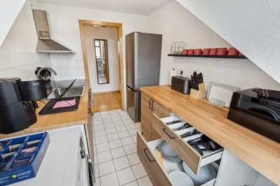 Küche/Küchenzeile in der Unterkunft Monteurwohnung bis 16 Personen WLAN, Waschmaschine, Smart-TV, Balkon
