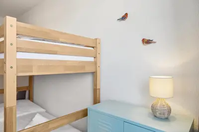 Ein Bett oder Betten in einem Zimmer der Unterkunft Großzügige Wohnung für Gruppen & Familien I Balkon