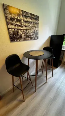 Ein Sitzbereich in der Unterkunft StayinDresden de Altbauperle mit Kingsize-Bett