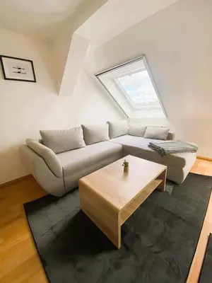 Ein Sitzbereich in der Unterkunft Gemütliches Altbauapartment III
