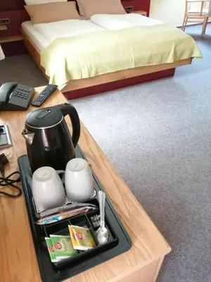 Ein Bett oder Betten in einem Zimmer der Unterkunft Gasthof Dittmannsdorf