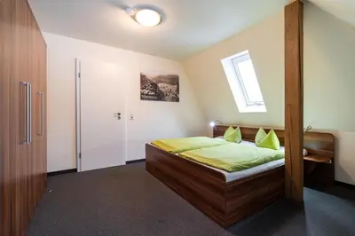 Ein Bett oder Betten in einem Zimmer der Unterkunft Apartment Felswelten