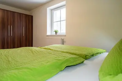 Ein Bett oder Betten in einem Zimmer der Unterkunft Apartment Felswelten