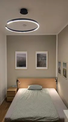 Ein Bett oder Betten in einem Zimmer der Unterkunft Kulturelles Businessapartment mit Balkon