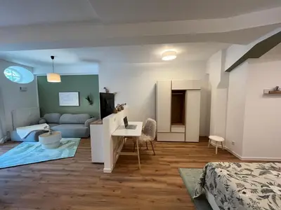 Ein Bett oder Betten in einem Zimmer der Unterkunft ANER 6 eleganter Loft mit Infrarotsauna in Dresden Weißer Hirsch