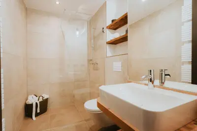 Ein Badezimmer in der Unterkunft WALDGUT Naturresort