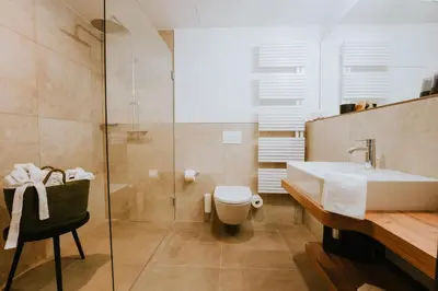 Ein Badezimmer in der Unterkunft WALDGUT Naturresort
