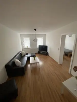 Ein Sitzbereich in der Unterkunft Ferienwohnung 2 am Holzwurm