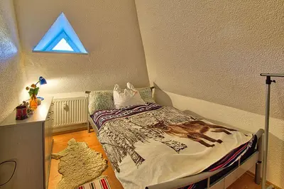 Ein Bett oder Betten in einem Zimmer der Unterkunft KUNSTLOFT - Atelier der Auszeit