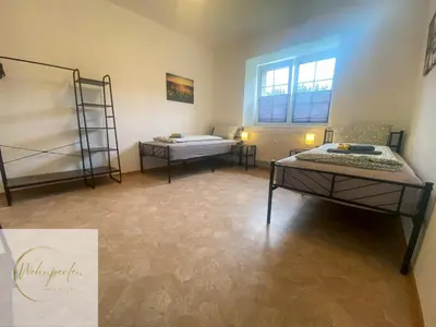 Ein Bett oder Betten in einem Zimmer der Unterkunft MonteurWohnung Fischbach App2