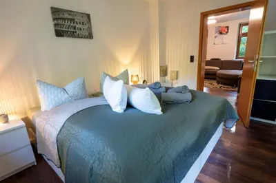 Ein Bett oder Betten in einem Zimmer der Unterkunft Villa Waldeck