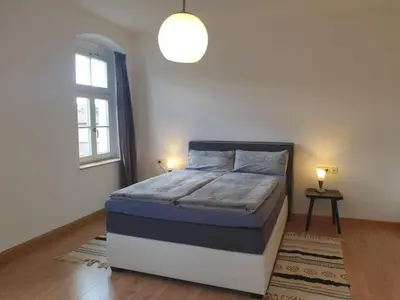 Ein Bett oder Betten in einem Zimmer der Unterkunft Zentral gelegene Wohnung