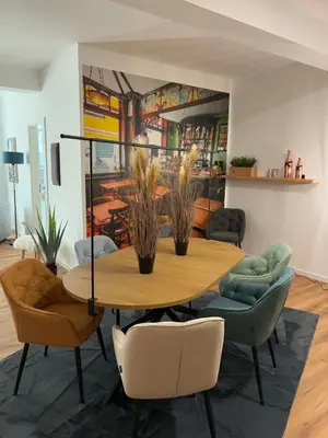 Ein Sitzbereich in der Unterkunft ANER 7 luxuriöses Familienapartment für bis zu 6 Personen mit kleinem Heimkino
