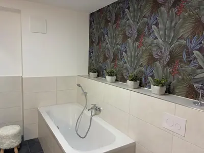 Ein Badezimmer in der Unterkunft ANER 7 luxuriöses Familienapartment für bis zu 6 Personen mit kleinem Heimkino