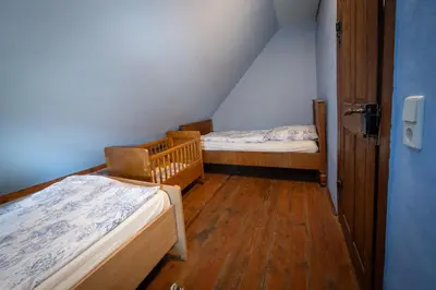 Ein Bett oder Betten in einem Zimmer der Unterkunft Haus Burgblick Döben