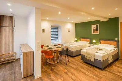 Ein Bett oder Betten in einem Zimmer der Unterkunft BaLa Suites Apartment House