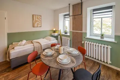 Ein Bett oder Betten in einem Zimmer der Unterkunft BaLa Suites Apartment House