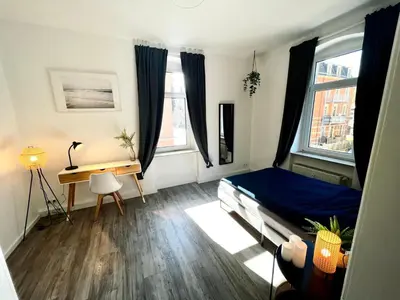 Ein Bett oder Betten in einem Zimmer der Unterkunft StayTime - Echo Loft