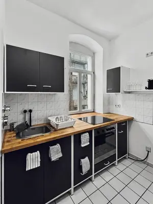 Küche/Küchenzeile in der Unterkunft StayTime - Wildflower Suite
