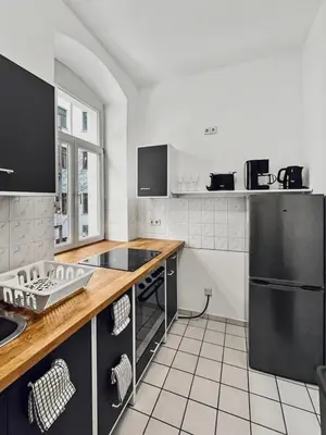 Küche/Küchenzeile in der Unterkunft StayTime - Wildflower Suite