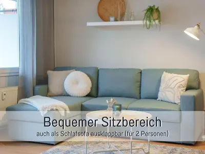 Ein Sitzbereich in der Unterkunft Benville BV12 - 54 qm mit Balkon - Parkplatz inklusive - WLAN - Spülmaschine - Bushaltestelle 50 m