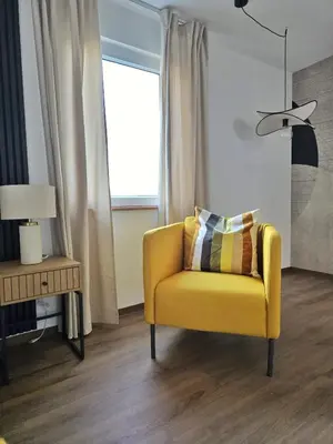 Ein Sitzbereich in der Unterkunft Ferienhaus Lyś