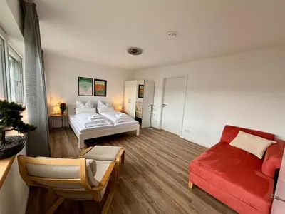 Ein Bett oder Betten in einem Zimmer der Unterkunft Neu in Dresden Stilvolles Apartment mit Balkon, Küche & Parkplatz
