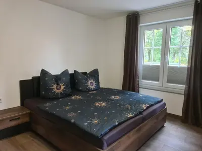 Ein Bett oder Betten in einem Zimmer der Unterkunft Ferienwohnung Tannert, 3-Raum Wohnung mit eigener Sauna