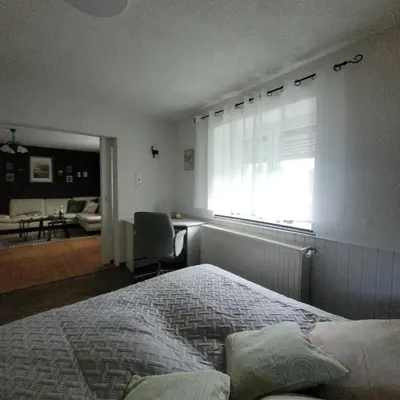 Ein Bett oder Betten in einem Zimmer der Unterkunft Pension - Ferienwohnung K&M