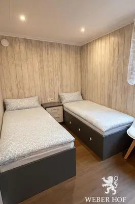 Ein Bett oder Betten in einem Zimmer der Unterkunft Weber Hof