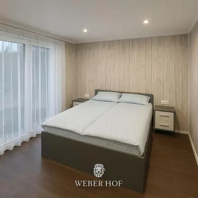 Ein Bett oder Betten in einem Zimmer der Unterkunft Weber Hof