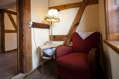 Ein Bett oder Betten in einem Zimmer der Unterkunft Pension Alte Schmiede