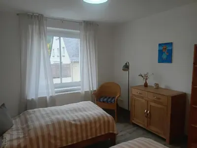 Ein Bett oder Betten in einem Zimmer der Unterkunft Am Tor zum Erzgebirge