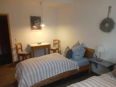 Ein Bett oder Betten in einem Zimmer der Unterkunft Am Tor zum Erzgebirge