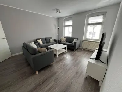 Ein Sitzbereich in der Unterkunft Stadtnahe 3-Schlafzimmer-Wohnung