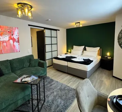 Ein Bett oder Betten in einem Zimmer der Unterkunft Ankommen & wohlfühlen - Ihr stilvolles Zuhause