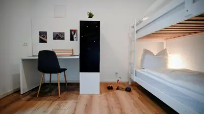 Ein Bett oder Betten in einem Zimmer der Unterkunft alte Bäckerei Ottendorf-Okrilla #Fritz#