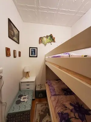 Ein Bett oder Betten in einem Zimmer der Unterkunft FERIENWOHNUNG Am Kegelsberg